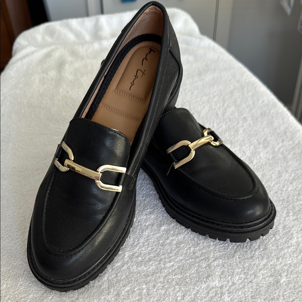 Elegant Black Loafers with Gold Accent